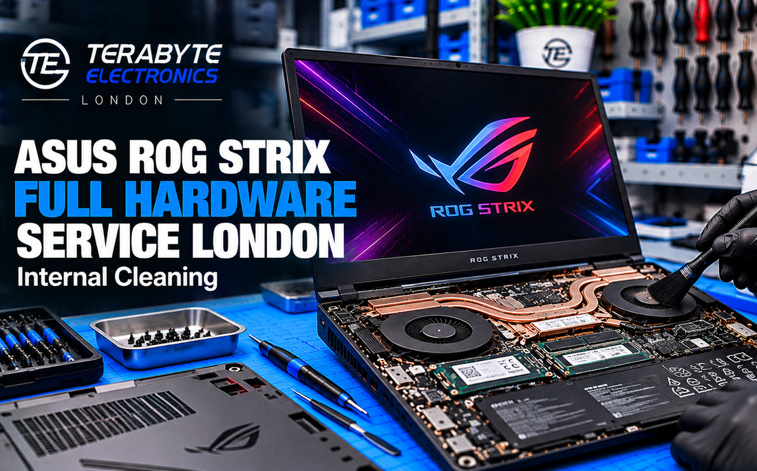 ASUS ROG Strix gaming laptop undergoing internal hardware cleaning and cooling system service at Terabyte Electronics London