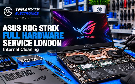 ASUS ROG Strix gaming laptop undergoing internal hardware cleaning and cooling system service at Terabyte Electronics London
