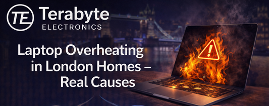 Laptop overheating in a London home showing warning symbol and heat issues, highlighting real causes of laptop overheating and repair solutions by Terabyte Electronics.