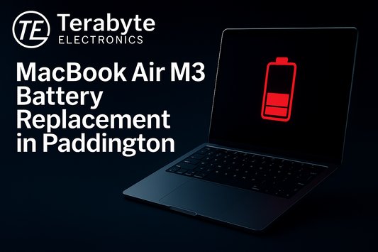 MacBook Air M3 battery replacement in Paddington – Terabyte Electronics dark-mode promo image showing a low-battery warning icon on a MacBook Air screen.