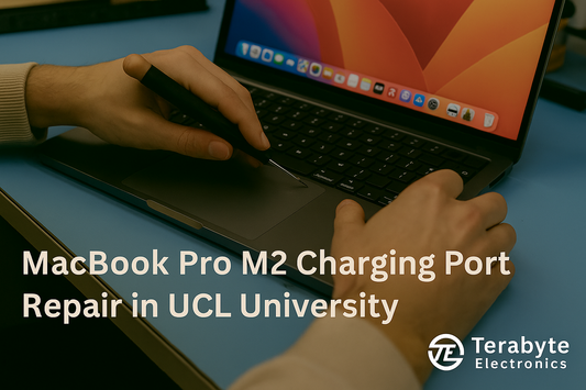Technician performing MacBook Pro M2 charging port repair at UCL University – professional Apple repair service by Terabyte Electronics