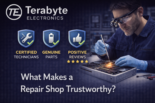 What makes a repair shop trustworthy, showing certified technician using genuine parts with positive reviews at Terabyte Electronics