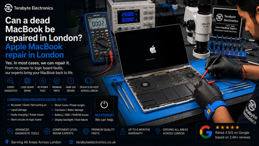 An electronics technician using a digital multimeter probe to test power circuits on a dead MacBook logic board at Terabyte Electronics London.