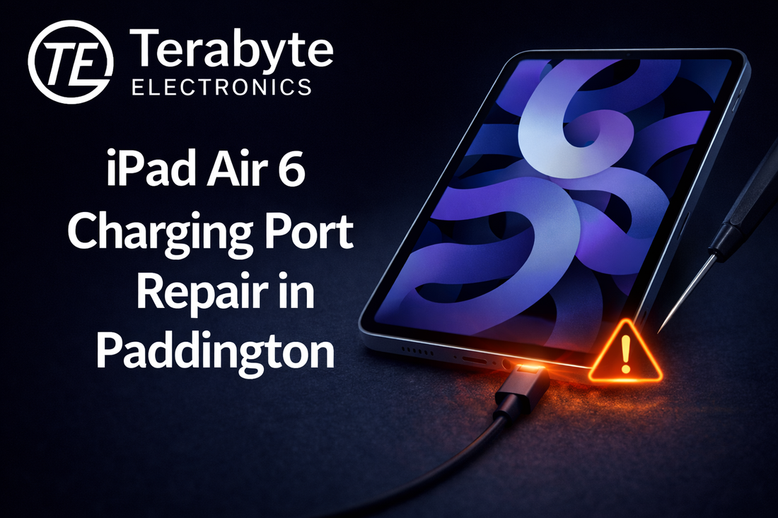 iPad Air 6 charging port repair in Paddington, showing tablet connected to charging cable with warning icon and repair tool by Terabyte Electronics