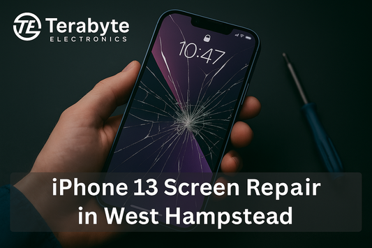 Terabyte Electronics blog image showing a cracked iPhone 13 screen being held with repair tools nearby, promoting screen repair services in West Hampstead.
