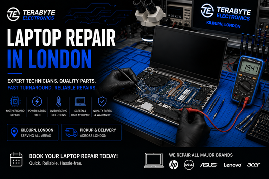 Open laptop on a blue repair mat undergoing power delivery testing and hardware diagnostics at Terabyte Electronics London.