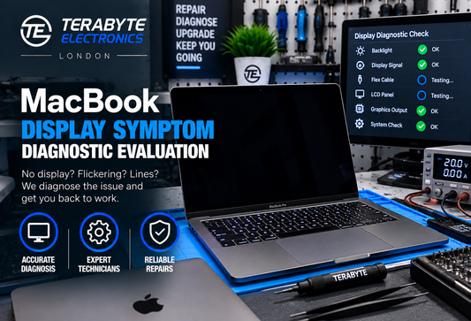 An opened MacBook with backlit keyboard illuminated while the screen display remains dark during diagnostic evaluation.