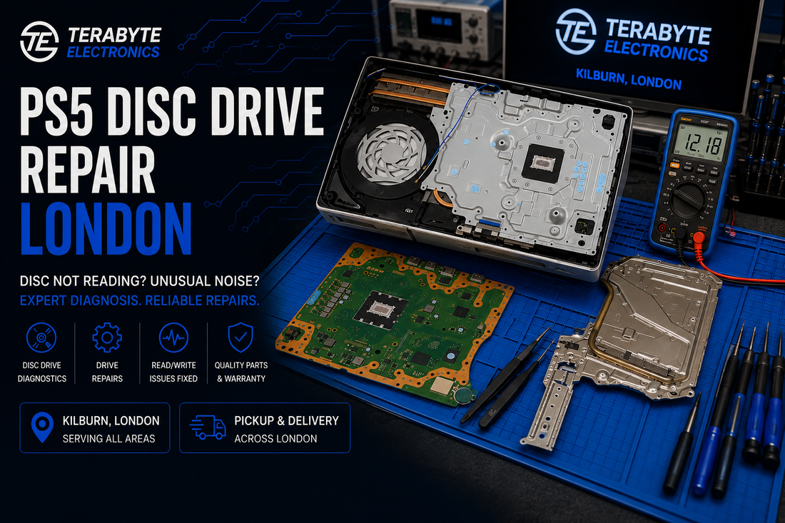 Open PlayStation 5 console on a blue repair mat undergoing optical disc drive testing and diagnostic assessment at Terabyte Electronics London.