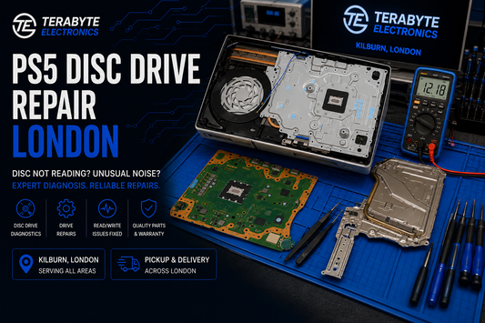 Open PlayStation 5 console on a blue repair mat undergoing optical disc drive testing and diagnostic assessment at Terabyte Electronics London.